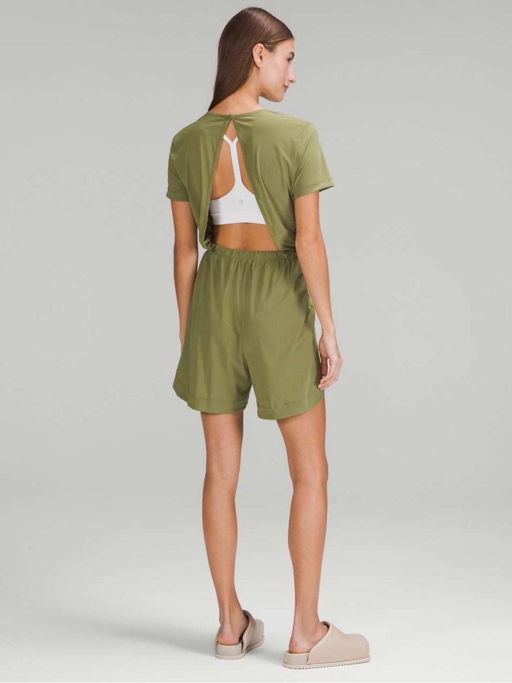 87. Lululemon Lightweight High-Neck Romper
Bronze Green size 8